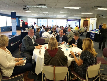 Oames Members And Exhibitors Network Over Lunch